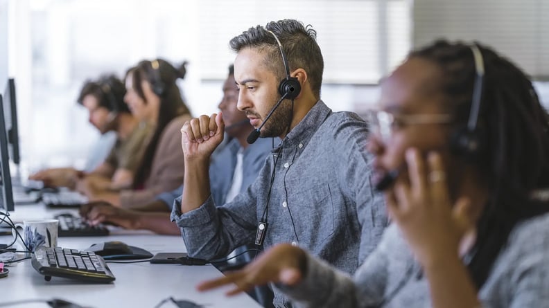 esm-customer-service-man-with-headset-call-center-serious