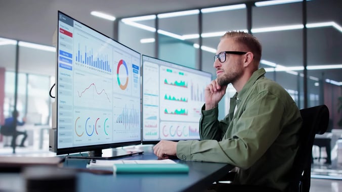 financial-man-with-dashboard-serious