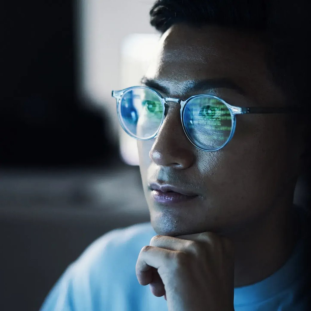 cyber-security-close-up-of-man-with-coding-reflection-in-glasses-square
