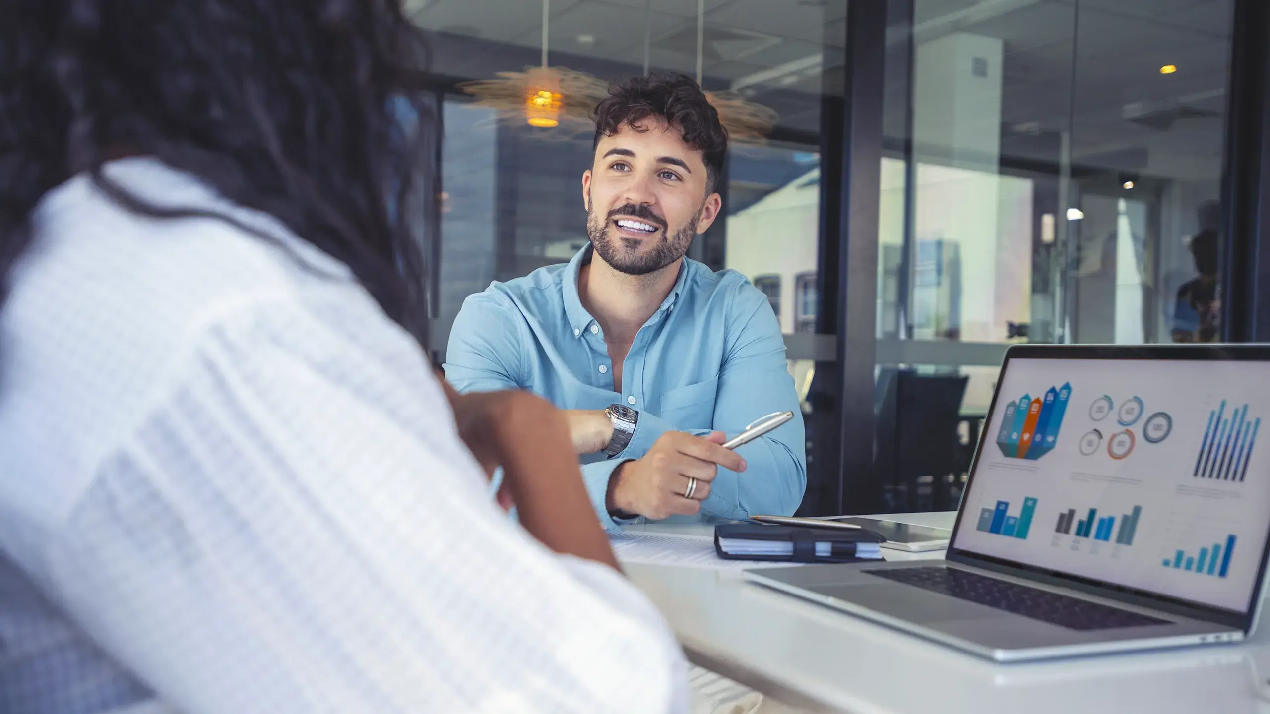 two people discussing AI in IT Finance