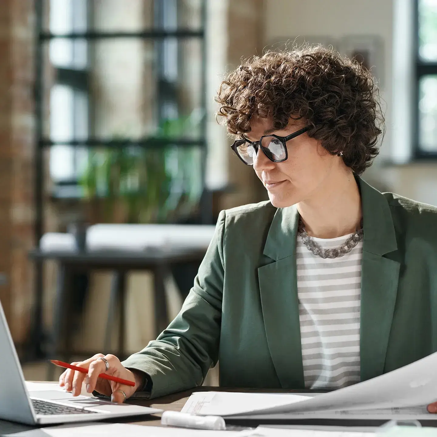 a woman working at her desk